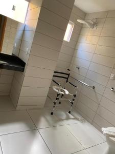 a bathroom with a shower with a toilet in it at RILL HOTEL BY UCHÔA in Teresina