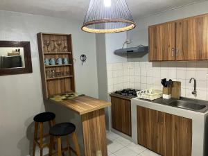 Dapur atau dapur kecil di Charming Studio in Grand Baie, 60 m² with Shared Pool