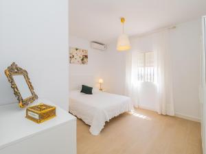 Łóżko lub łóżka w pokoju w obiekcie Cubo´s Finca Mis Seis Soles