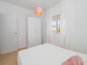 Łóżko lub łóżka w pokoju w obiekcie Cubo´s Finca Mis Seis Soles