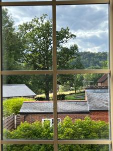 a view from a window of a building at The Loft, Steep, Petersfield in Collyers Estate part of The South Downs National Park. in Petersfield