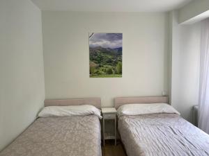 Postel nebo postele na pokoji v ubytování Acogedor Apartamento en zona privilegiada
