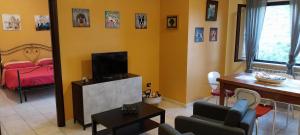 TV a/nebo společenská místnost v ubytování Casa di Ninni