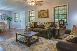 A seating area at Searcy Vacation Rental with Deck and Water Views!