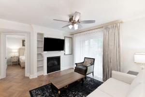 a living room with a flat screen tv and a couch at Westgate Historic Williamsburg Resort in Williamsburg