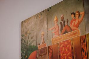 a painting on the wall of a temple at Casa Liza in San Miguel de Allende