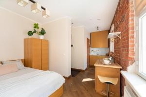 Postel nebo postele na pokoji v ubytování Rüütli Apartments in Tartu Old Town