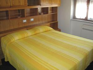 Postel nebo postele na pokoji v ubytování B&B Il Brigante