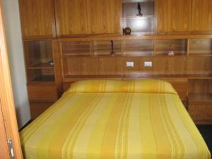 Postel nebo postele na pokoji v ubytování B&B Il Brigante