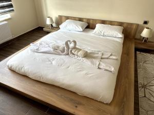 Postel nebo postele na pokoji v ubytování THE SUİT Residence Daire