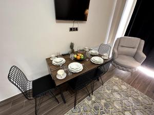 Posezení v ubytování THE SUİT Residence Daire + 7 fotografií