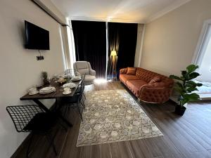 Posezení v ubytování THE SUİT Residence Daire