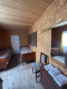 Voodi või voodid majutusasutuse Shio's Stonehouse in Tusheti toas