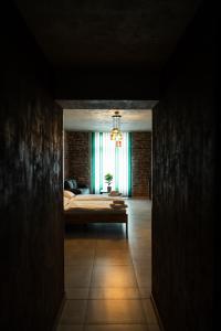 Voodi või voodid majutusasutuse Hotel JURKOS toas