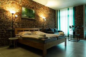 Voodi või voodid majutusasutuse Hotel JURKOS toas