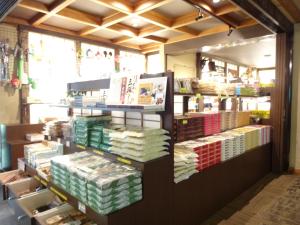 a book store with a display of books at Natsukashiya Fuwari in Nikko