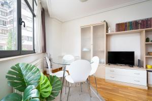 TV a/nebo společenská místnost v ubytování MyHouseSpain - Bibio apartamento junto a playa