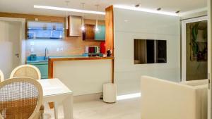 Una cocina o zona de cocina en Ipanema Wave Apart Hotel de Luxo Y11-005