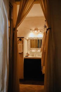 a bathroom with a sink and a mirror at Casa Florida B&B in San Miguel de Allende