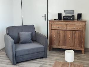 TV a/nebo společenská místnost v ubytování Apartmány Goliáš