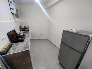 Kuchyň nebo kuchyňský kout v ubytování Breeze apart - 2 facade & WiFi