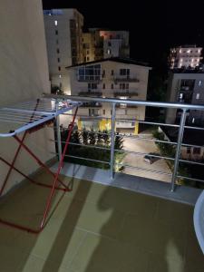 a metal railing on the roof of a building at Apartamente Kune Shengjin in Lezhë