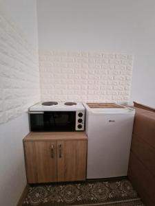 Kuchyň nebo kuchyňský kout v ubytování Studio Petrovac