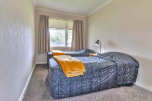 Postel nebo postele na pokoji v ubytování Aztec Motel