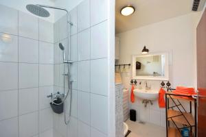 a bathroom with a shower and a sink at Apartment Pepica in Postira +29 photos