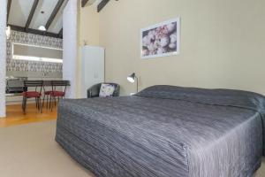Postel nebo postele na pokoji v ubytování Aztec Motel