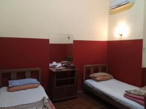 Postel nebo postele na pokoji v ubytování Safary Hotel