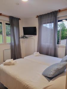 Postel nebo postele na pokoji v ubytování Maile Apartamentos