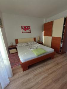 Postel nebo postele na pokoji v ubytování Apartments Lana
