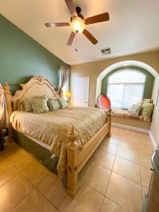 a bedroom with a bed and a ceiling fan at The Inn at 37 Main in Rockville
