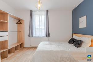 Posteľ alebo postele v izbe v ubytovaní 3 APPTS - 3 à 7 lits - Parfait 6 à 10 pers - max 29 pers - 1 immeuble - Convivialité, Rentabilité ------ ENGLISH - 3 APTS - 3 to 7 beds - Ideal for 6 to 10 guests - Up to 29 - Same building -- Cattenom