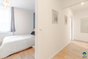 Posteľ alebo postele v izbe v ubytovaní 3 APPTS - 3 à 7 lits - Parfait 6 à 10 pers - max 29 pers - 1 immeuble - Convivialité, Rentabilité ------ ENGLISH - 3 APTS - 3 to 7 beds - Ideal for 6 to 10 guests - Up to 29 - Same building -- Cattenom