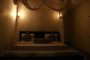 Een bed of bedden in een kamer bij Different View