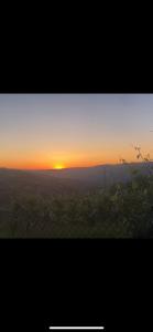 O nascer ou o pôr do sol visto a partir da casa de férias