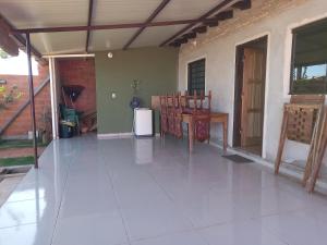 an empty patio with a table and chairs on it at De vuelta a casa in Zarate Isla +7 photos
