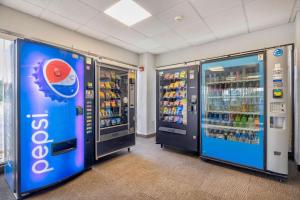 two vending machines in a room with drinks at Motel 6-Villa Park, IL - Chicago West in Villa Park