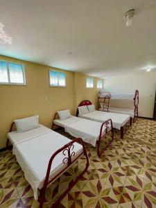 เตียงในห้องที่ Hotel Los Balcones