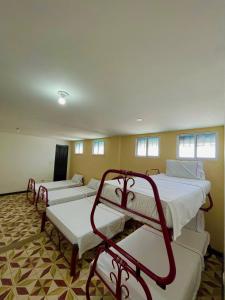 เตียงในห้องที่ Hotel Los Balcones