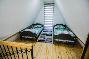 Postel nebo postele na pokoji v ubytování Vila Nina i Lux apartman