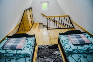 Postel nebo postele na pokoji v ubytování Vila Nina i Lux apartman