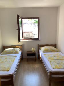 Postel nebo postele na pokoji v ubytování Apartments with a parking space Crikvenica - 5493
