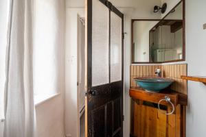 Vannituba majutusasutuses Owl's Nest Suites