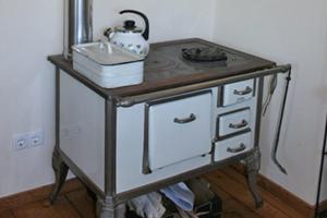 a table with a tea kettle on top of it at Ferienwohnung Schlössershof in Borler +24 photos