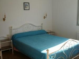 Säng eller sängar i ett rum på Appartement Canet-Plage, 3 pièces, 6 personnes - FR-1-750-15