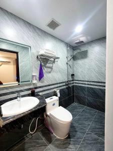 Koupelna v ubytování Swan Motel