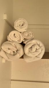 a pile of towels sitting on top of a wall at MaiLan Hale in Kailua-Kona